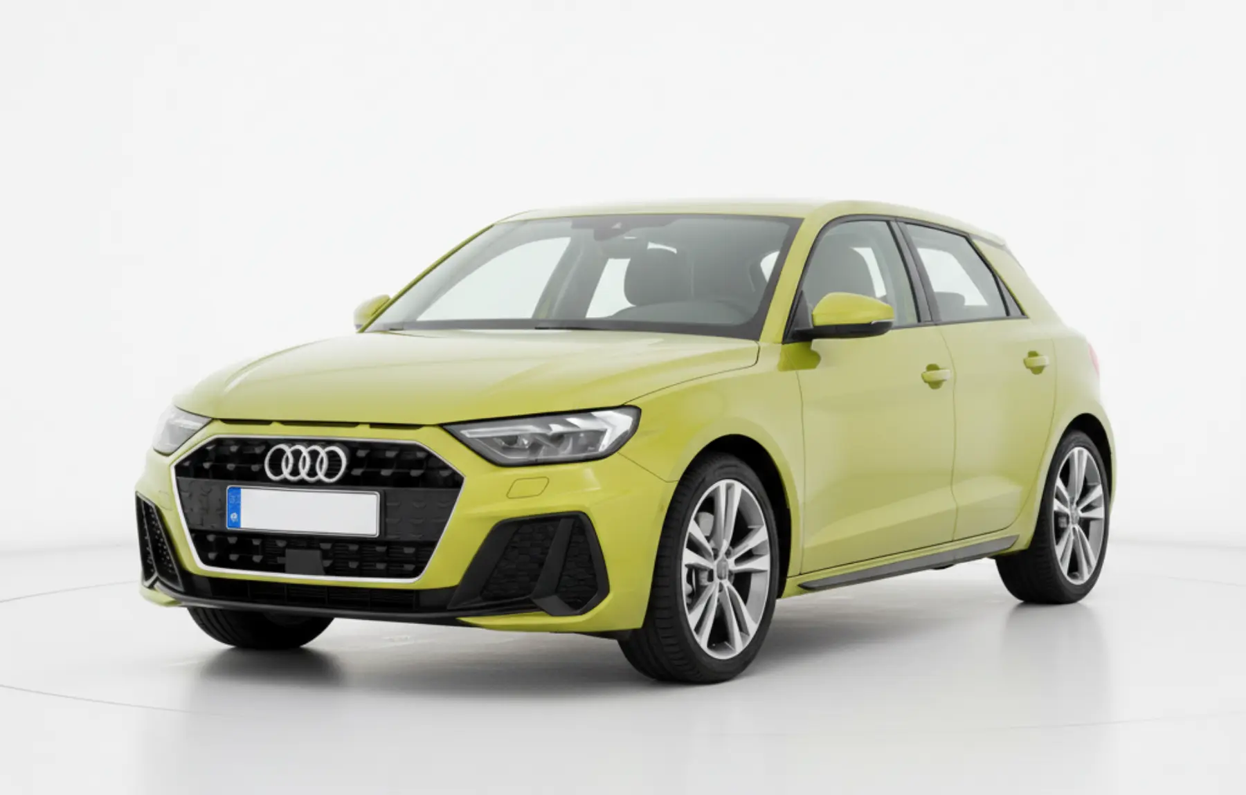 Преміальний компактний хетчбек Audi A1 Sportback жовтого кольору на студійному фоні.